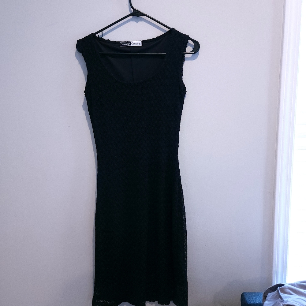 Sleeveless black shift dress
